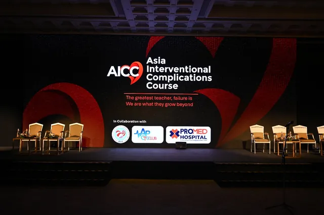The main stage before the opening, with the course backdrop and partner logos