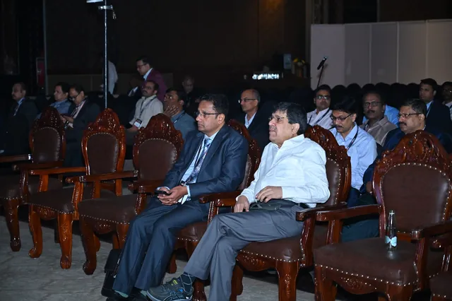Delegates watching a session from the front rows