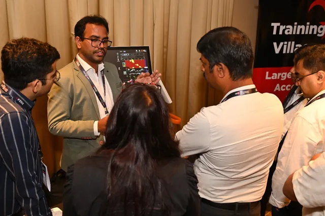 Delegates around an imaging console in the hands-on training village